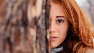 Woman red hair portraits blurry - her neck and a scarf free wallpaper