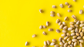 Nuts pile yellow background green - nuts free wallpaper