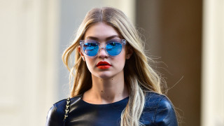 Woman blue sunglasses black top - a red lipstick free wallpaper