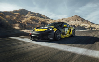 Yellow black sports car desert 3 - a road in the desert free wallpaper