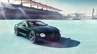 Green sports car stadium parking - a green sports car free wallpaper