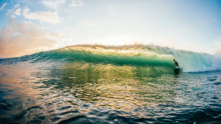 Surfer wave ocean sunset impressionist - in the ocean free wallpaper