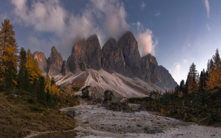 Mountain range forest sky clouds - a few tree free wallpaper