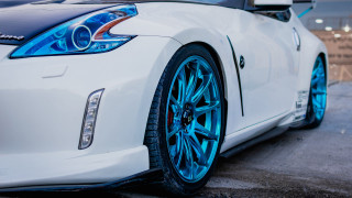 White sports car blue wheels - a full moon in the sky free wallpaper for desktop