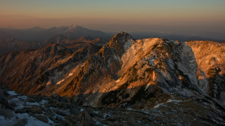 Mountain range sunset snow clouds 2 - a few snow covered mountains free wallpaper