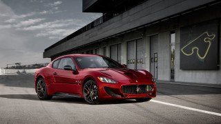 Red sports car building clouds - bernardo cavallino free wallpaper