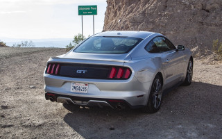 Silver mustang rock formation highway - side profile free wallpaper