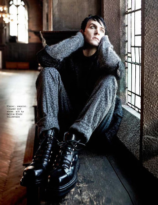 Man sitting gothic puzzle coat - magazine free wallpaper