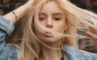 Blonde woman wind blown hands - evan charlton free wallpaper