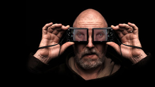 Man holding phone glasses hyperrealism - a cell free wallpaper
