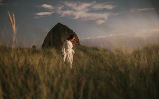 Woman dress field rock clouds - tall grass free wallpaper for desktop