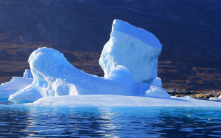 Iceberg mountain range blue sky - a large iceberg free wallpaper