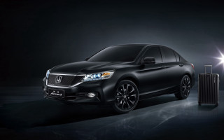 Black car suitcase shining light - a suitcase in front free wallpaper