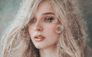 Blonde woman glittery makeup wind - her face and hair free wallpaper