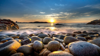 Sunset rocky beach waves island - a sunset over a rocky beach free wallpaper