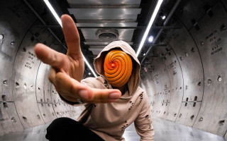 Hooded person spiral face illusion - artgem free wallpaper