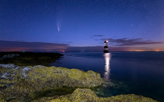 Lighthouse rocky shore night space - free airplane wallpaper