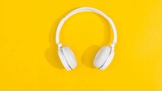 White headphones yellow background shadow - a pair free wallpaper for desktop