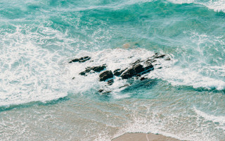 Rock ocean waves bird beach - a rock in the middle of the ocean free wallpaper