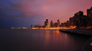 City skyline night water reflection 5 - a city skyline in the background free wallpaper
