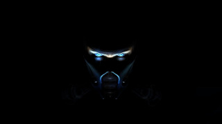 Creepy glowing eyes hooded male - a creepy look free wallpaper