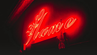 Neon mama clock viennese actionism - side of a building free wallpaper