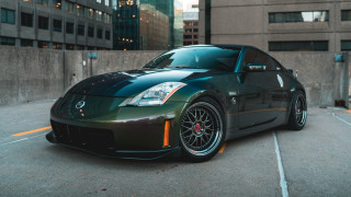 Green sports car parking meter - a parking lot in front free wallpaper