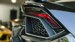 Car tail light grilles showroom - sharp detail free wallpaper