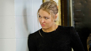 Woman standing white wall cell - movie still free wallpaper