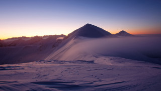 Snowy mountain sunset low cloud - low free wallpaper