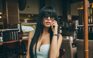Woman white dress cellphone restaurant - long black hair free wallpaper