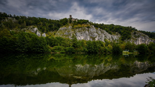 Lake forest castle cloudy sky - a hill in the background free wallpaper