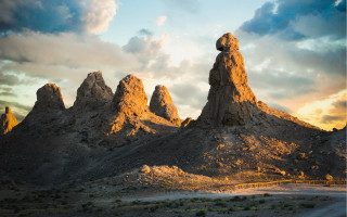 Desert rocks cloudy sky matte - a group of rocks free wallpaper