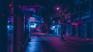 Motorcycle rider neon city night - a dark street free wallpaper