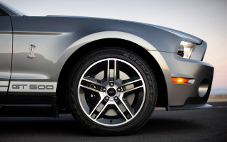 Car tire closeup sunset road - a close up of a car tire free wallpaper