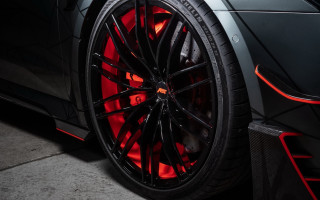 Car tire rim lights black 2 - a close up of a car tire free wallpaper