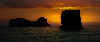 Sunset ocean rock formation dramatic - dramatic light free wallpaper