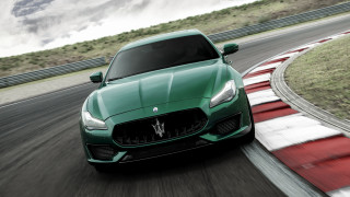 Green maserati driving cloudy sky - a track free wallpaper for desktop
