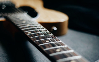 Guitar neck picker tabletop background - grunge free wallpaper