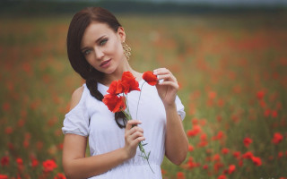 Woman flower field serious portrait 2 - anna hotchkis free wallpaper