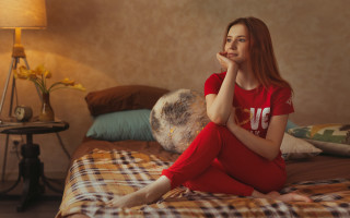 Woman in red pajamas sitting - a lamp free wallpaper for desktop