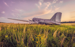 Plane field purple sky dieselpunk - a purple sky in the background free wallpaper for desktop