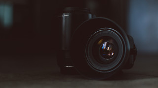 Camera lens table blurry background - a camera len free wallpaper