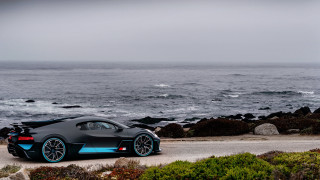 Black blue sportscar ocean road - sports car free wallpaper