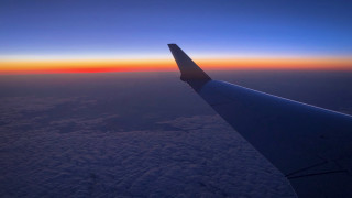 Plane wing sunset ocean horizon - artistic free wallpaper