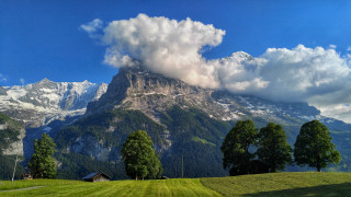 Mountain cloud forest houses beach - a cloud in the sky above free wallpaper