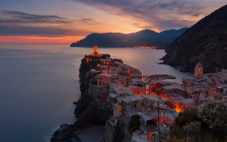 Cliff village ocean sunset mountain 2 - a village free wallpaper