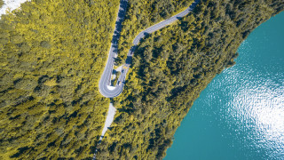 Winding road forest lake car - path free wallpaper