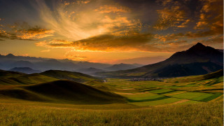 Sunset valley mountains grass dusk - landscape free wallpaper