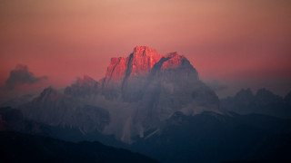 Mountain range red sky clouds 2 - a red sky in the background free wallpaper